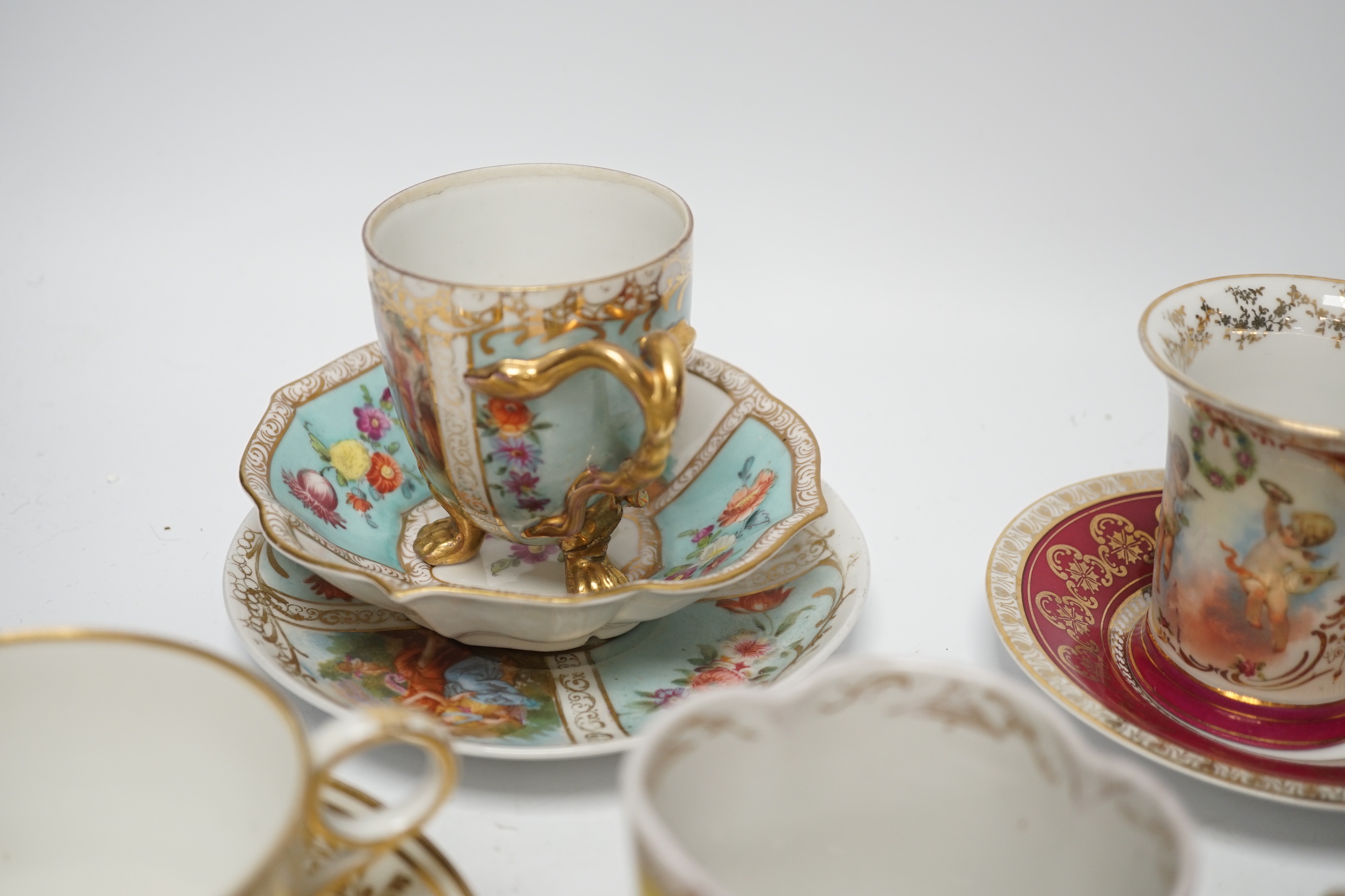 An Austrian chocolate cup and saucer, a similar trio, a BFB Worcester cup and saucer, a pair of spoon trays, etc. , spoon trays 15.5cm wide (14)